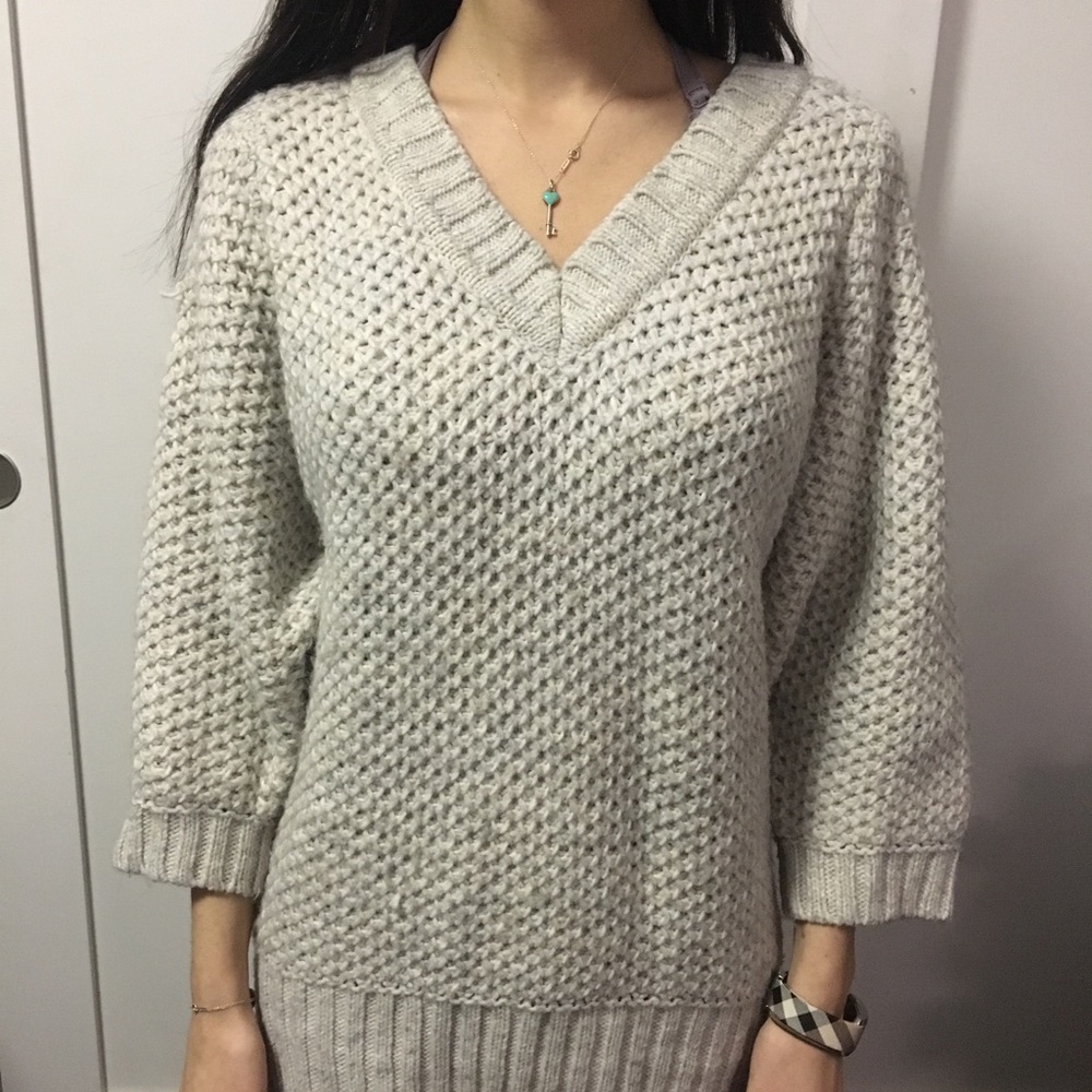 Knitted silver sweater